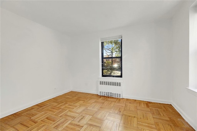 35 Oliver St Unit 1D, Brooklyn, NY 11209 - spare room with radiator heating unit and baseboards