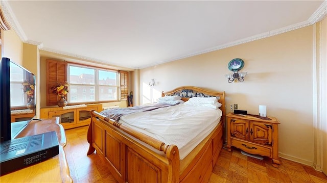 bedroom featuring crown molding