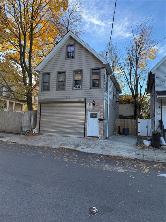 front of property with a garage