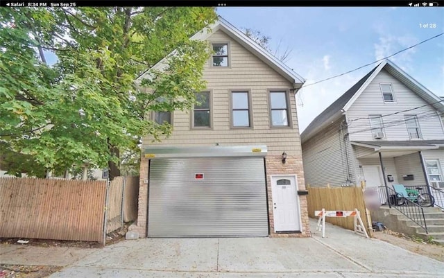 view of property featuring a garage