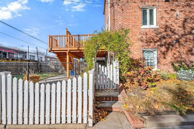 view of front of property featuring a wooden deck