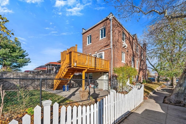 exterior space featuring a wooden deck