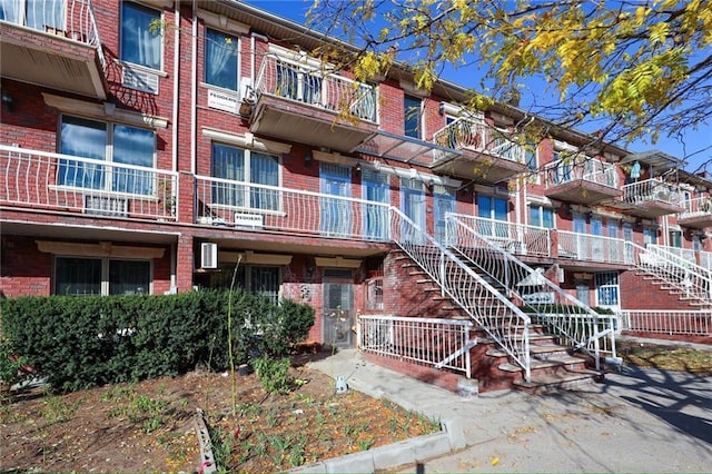 view of building exterior with stairway