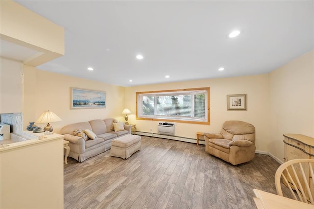 living room featuring baseboard heating and hardwood / wood-style floors