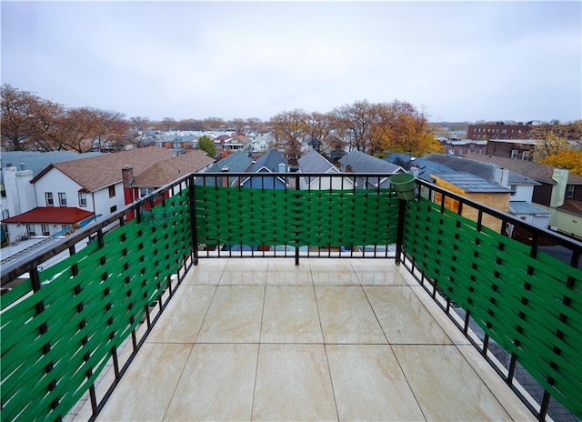 balcony featuring a residential view