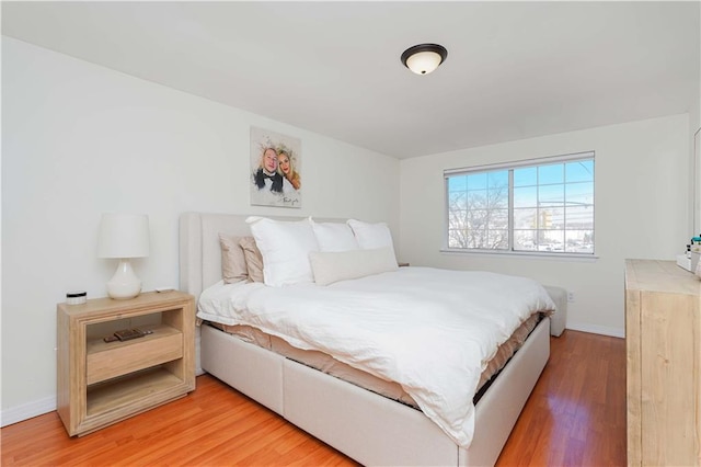 bedroom featuring hardwood / wood-style floors