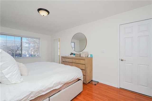 bedroom with light hardwood / wood-style floors