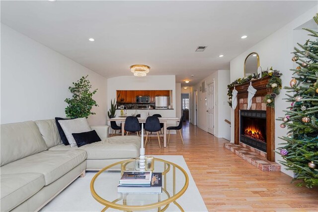 living room with light hardwood / wood-style flooring