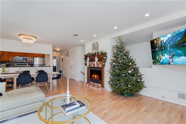 living room with light hardwood / wood-style floors