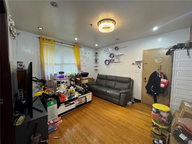 living room with light hardwood / wood-style flooring