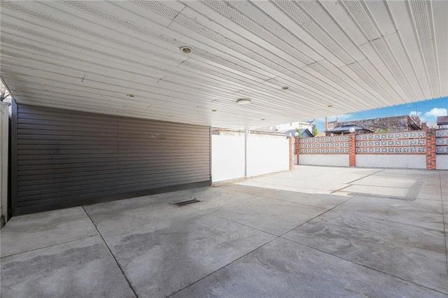 view of patio / terrace featuring a carport