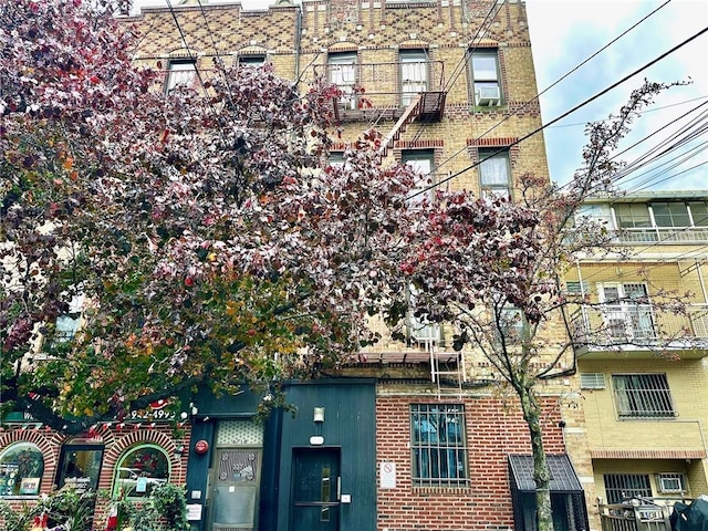 view of building exterior with cooling unit