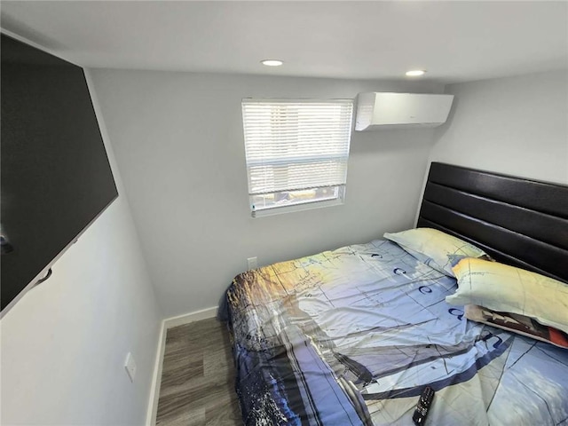 bedroom with recessed lighting and baseboards