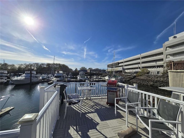 deck featuring a water view