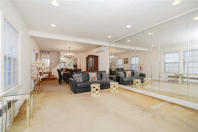living room featuring a chandelier, a wall mounted air conditioner, carpet flooring, and recessed lighting