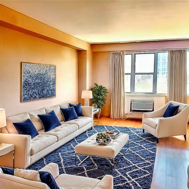 living room featuring a wall unit AC and wood finished floors