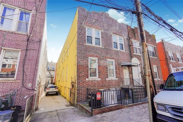 view of front of home featuring brick siding