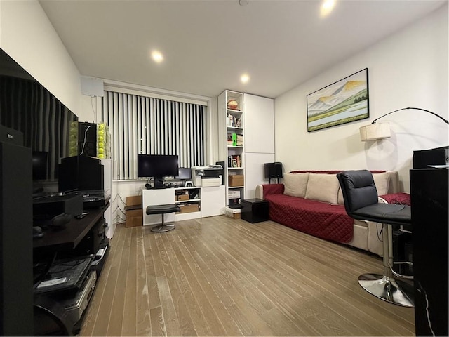 living room with light hardwood / wood-style floors