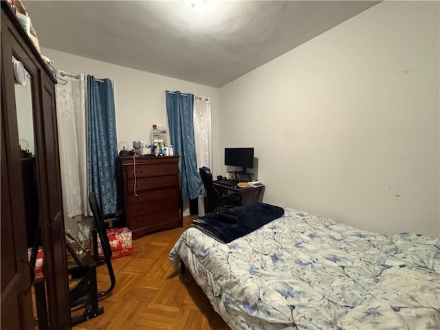 bedroom with parquet floors