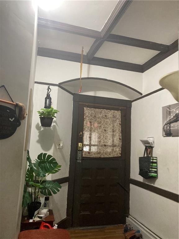 entryway featuring beamed ceiling and coffered ceiling