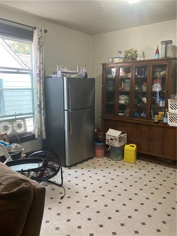 kitchen featuring stainless steel fridge