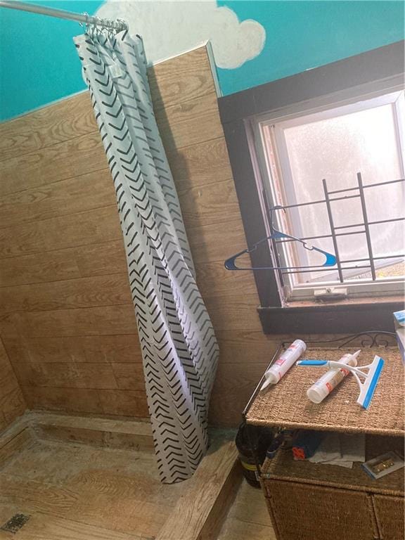 bathroom with a shower with shower curtain