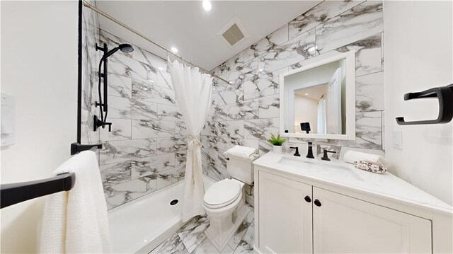 bathroom featuring a shower with shower curtain, vanity, toilet, and tile walls