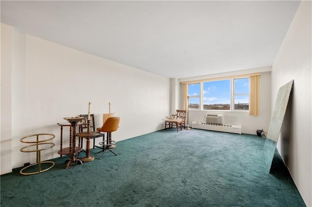 living area with carpet floors and baseboard heating