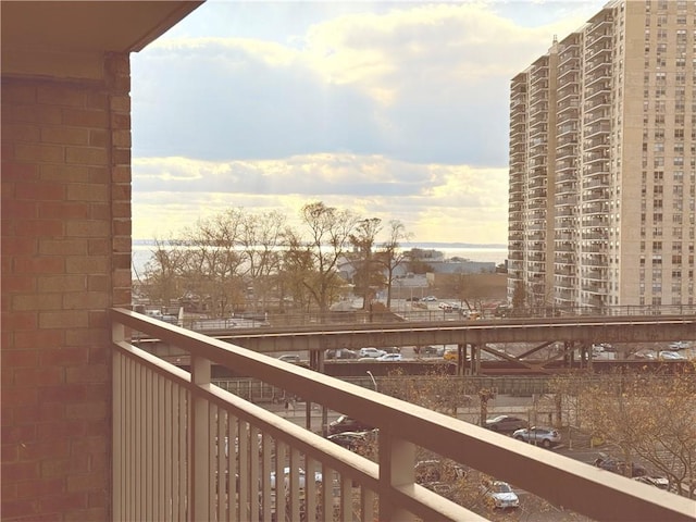 view of balcony at dusk