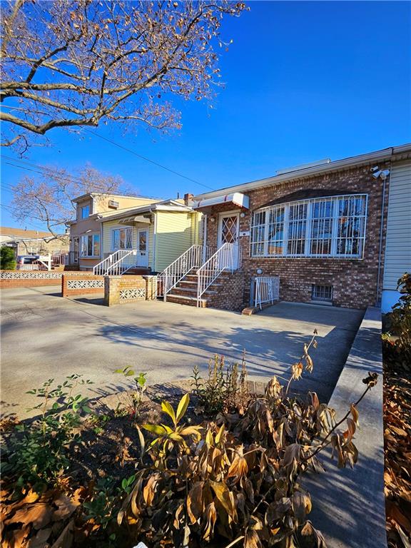 view of front of property with brick siding