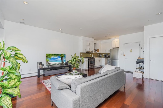 living room featuring dark hardwood / wood-style flooring