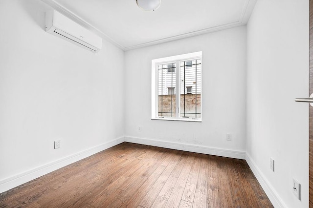 2335 Bath Ave Unit 1A, Brooklyn, NY 11214 - empty room featuring a wall mounted air conditioner, hardwood / wood-style flooring, ornamental molding, and baseboards