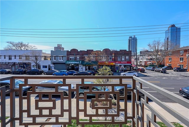 balcony featuring a view of city