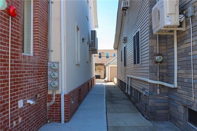 view of home's exterior with cooling unit