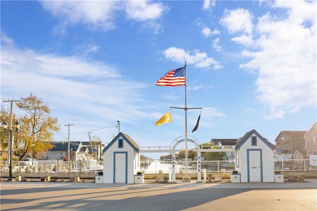 view of property's community featuring a shed