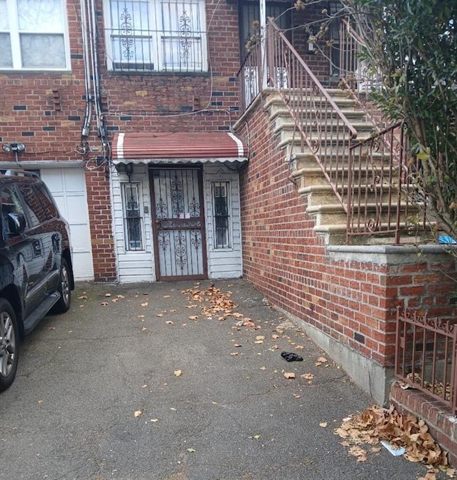 entrance to property featuring a garage