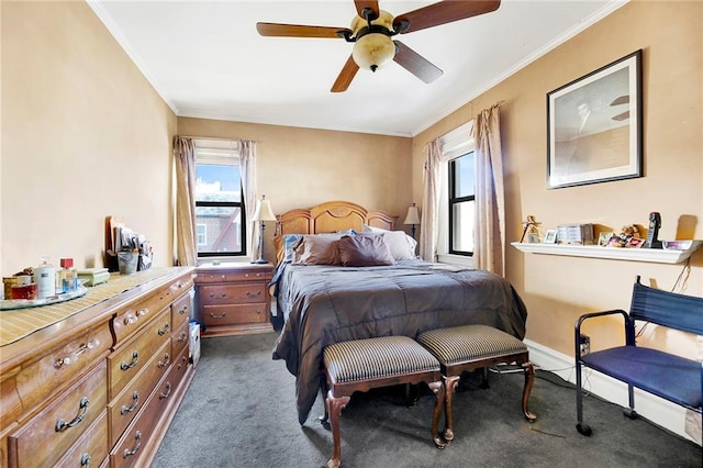 carpeted bedroom featuring ceiling fan and multiple windows