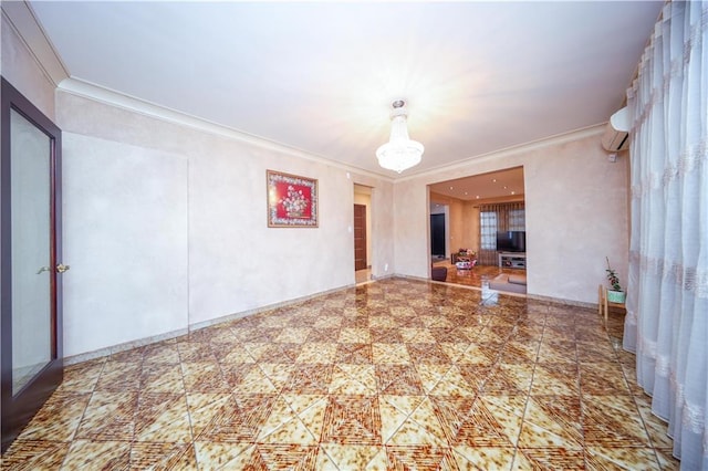 unfurnished living room with crown molding and an inviting chandelier