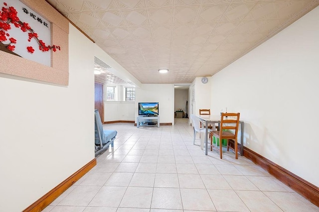 interior space featuring light tile patterned floors