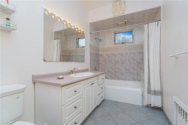 full bath with vanity, toilet, visible vents, tile patterned flooring, and shower / bath combination with curtain