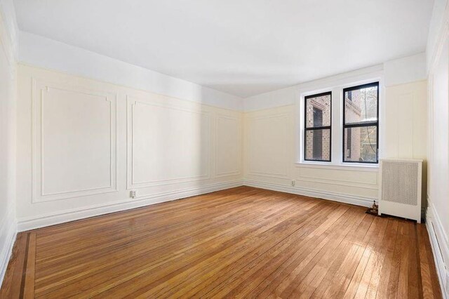 hallway featuring light hardwood / wood-style flooring