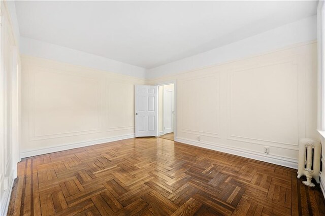 hall with wood-type flooring