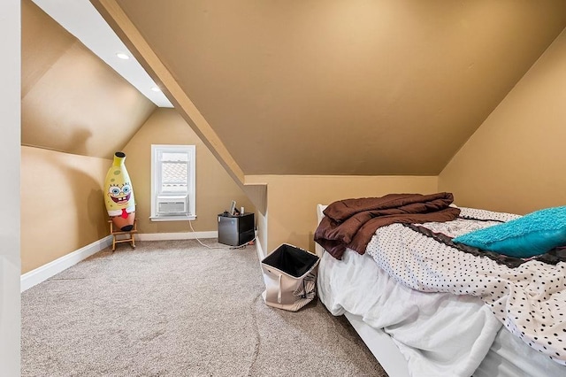 bedroom featuring cooling unit, baseboards, vaulted ceiling, and carpet flooring