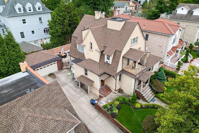 birds eye view of property with a residential view