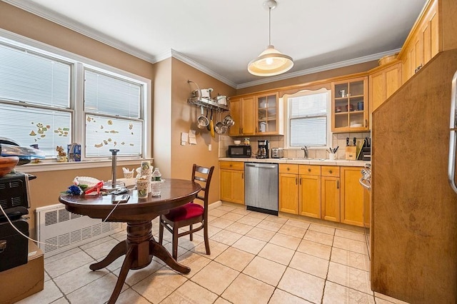 kitchen with dishwasher, glass insert cabinets, light countertops, black microwave, and a sink