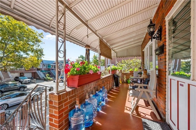 view of patio featuring covered porch