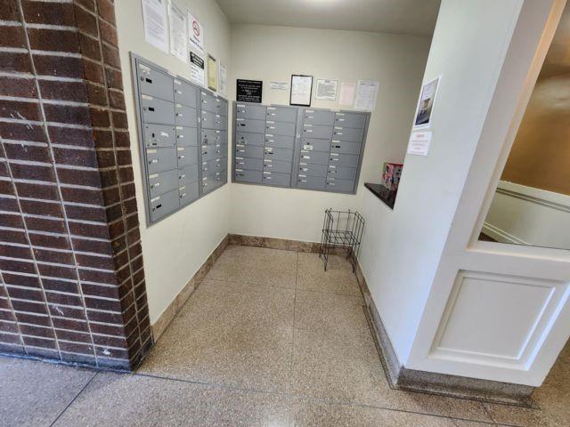 view of community featuring mail boxes