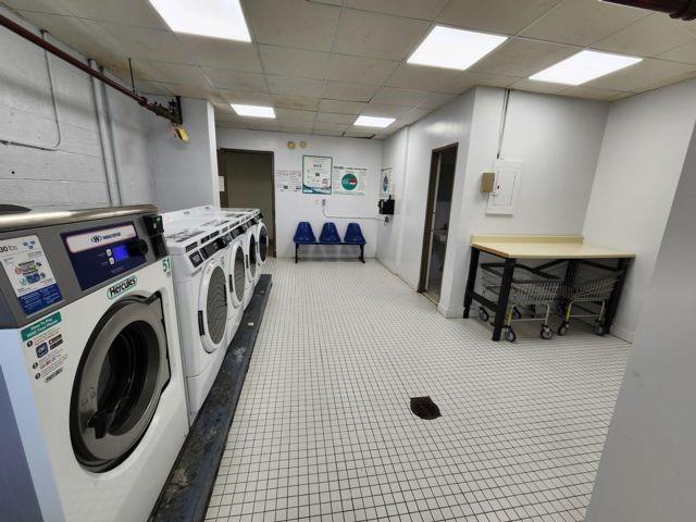 laundry area with separate washer and dryer