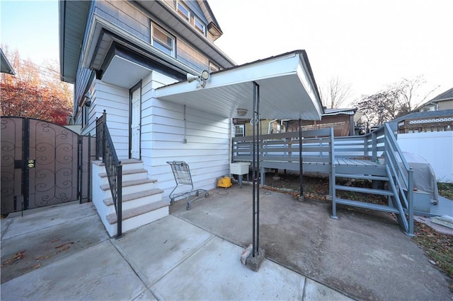 view of patio / terrace featuring a gate and fence