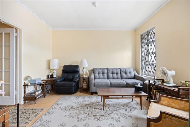 living room featuring light wood-type flooring and crown molding